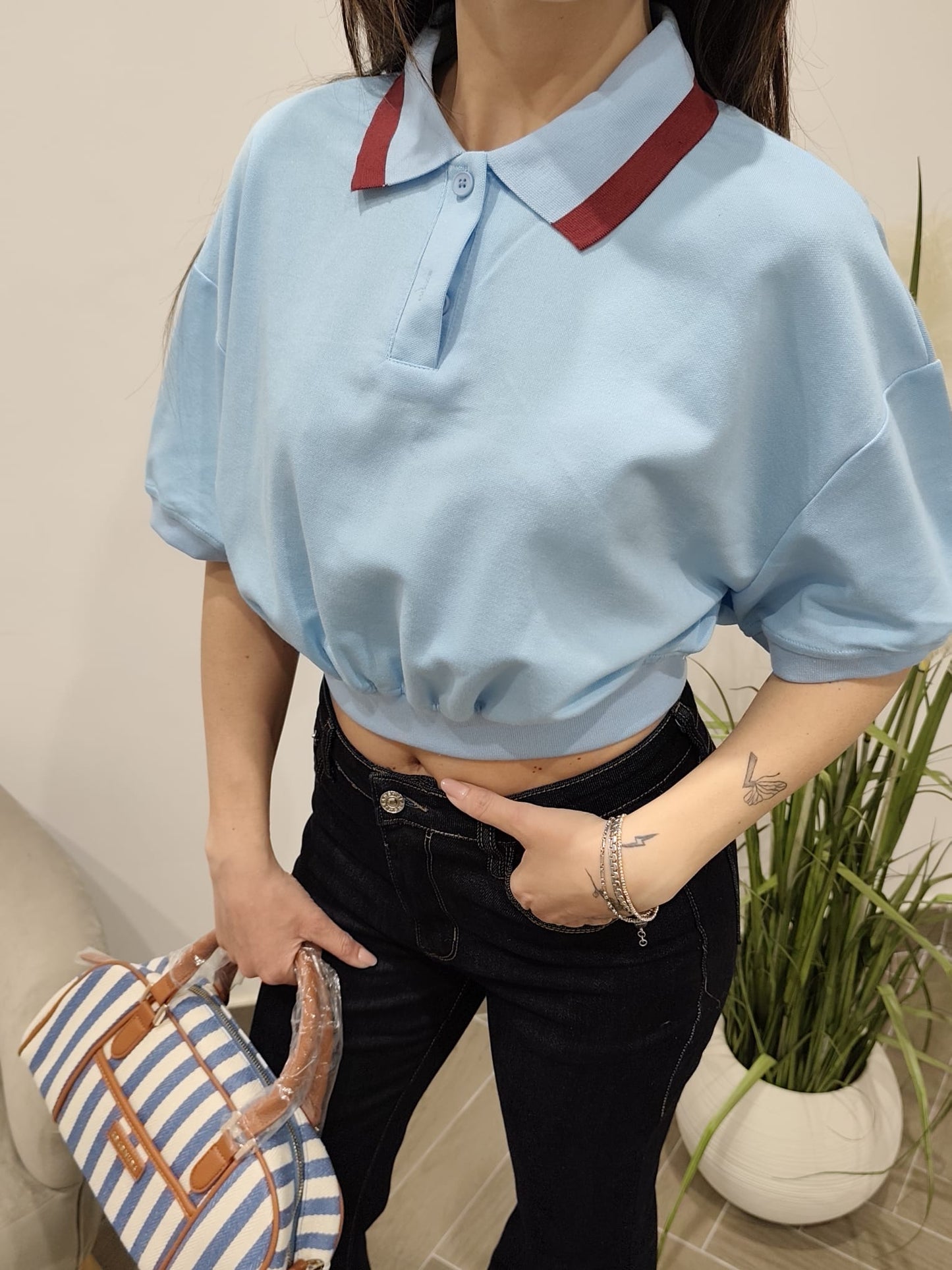 Polo turchese