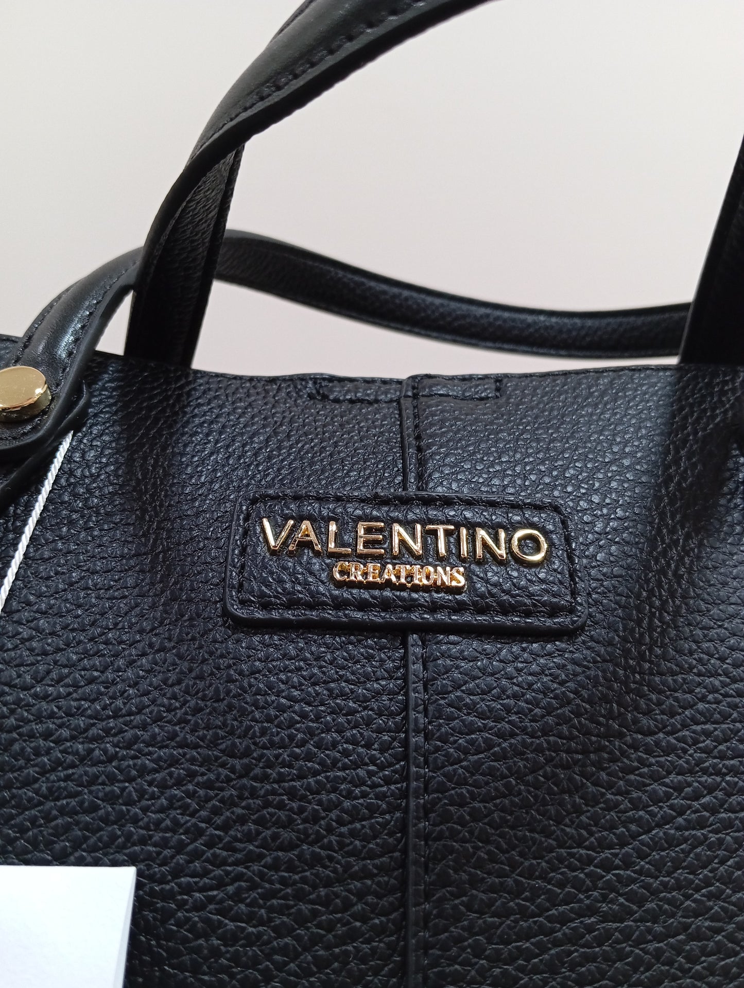 Borsa con finte tracolle